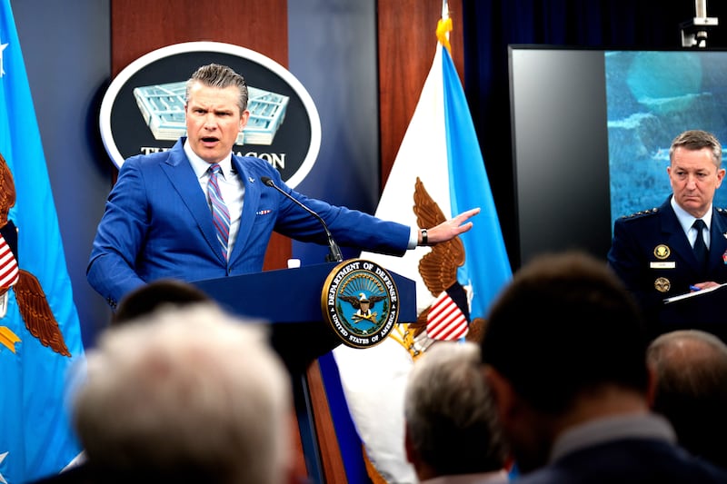 Defense Secretary Pete Hegseth (L), accompanied by Chairman of the Joint Chiefs of Staff Air Force Gen. Dan Caine (R), speaks during a news conference at the Pentagon on June 26, 2025 in Arlington, Virginia.