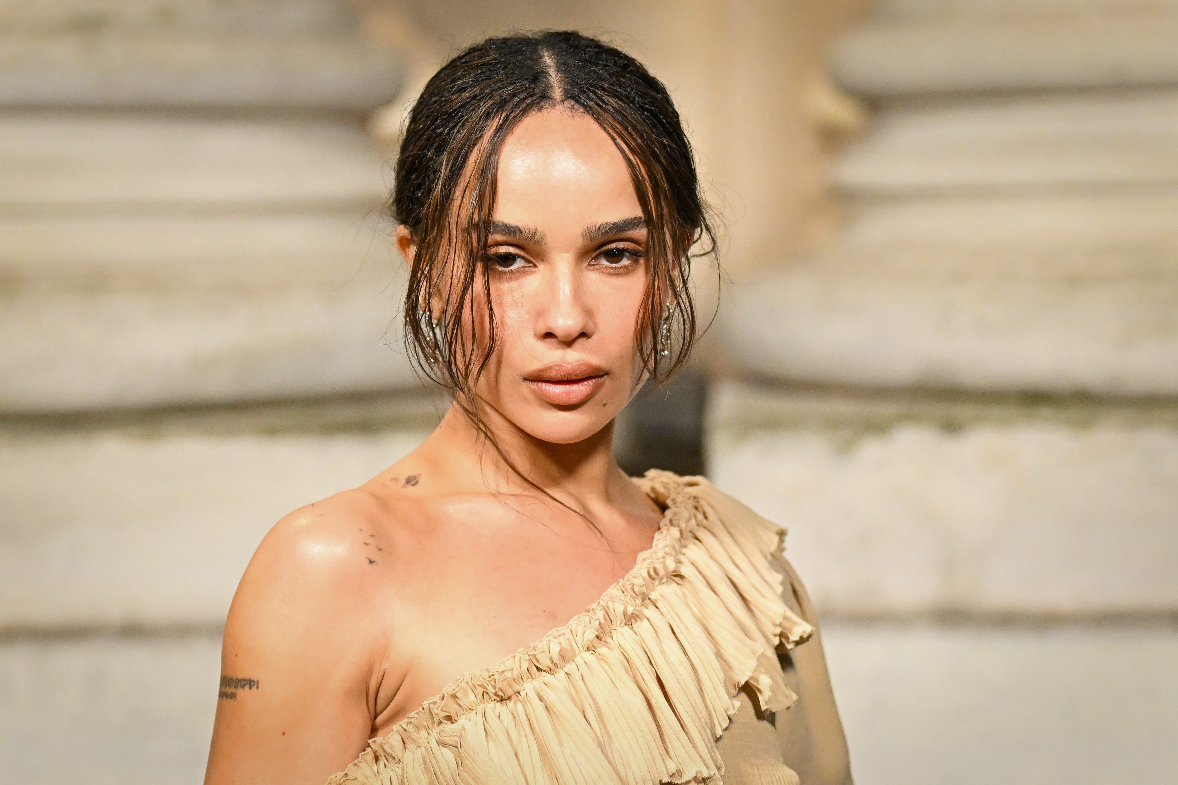 Zoe Kravitz attends the Saint Laurent Menswear Fall-Winter 2025/2026 show as part of Paris Fashion Week