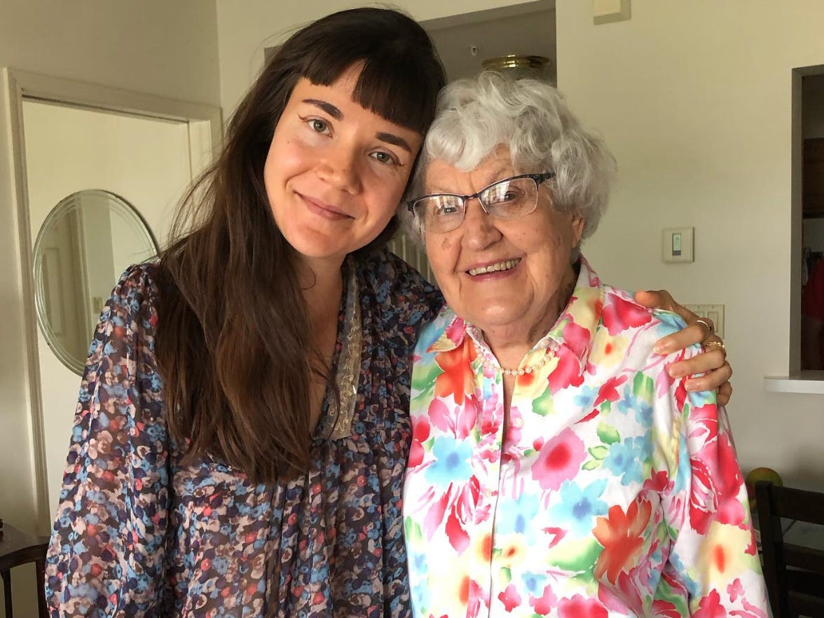 The author posing with her grandmother.