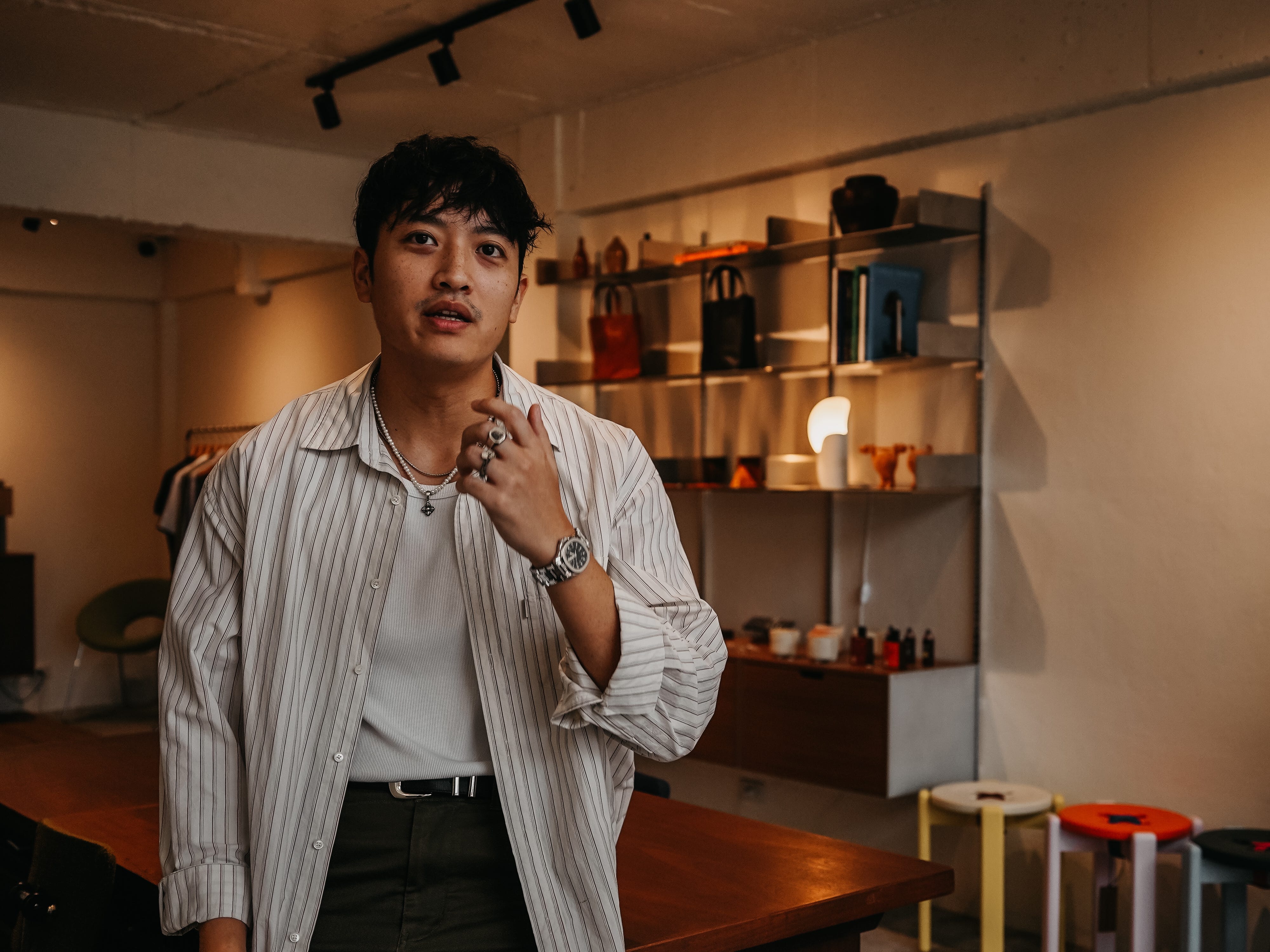 Sutasit Srivisarvach standing in Fewer Better Things, his shop in Bangkok, Thailand.