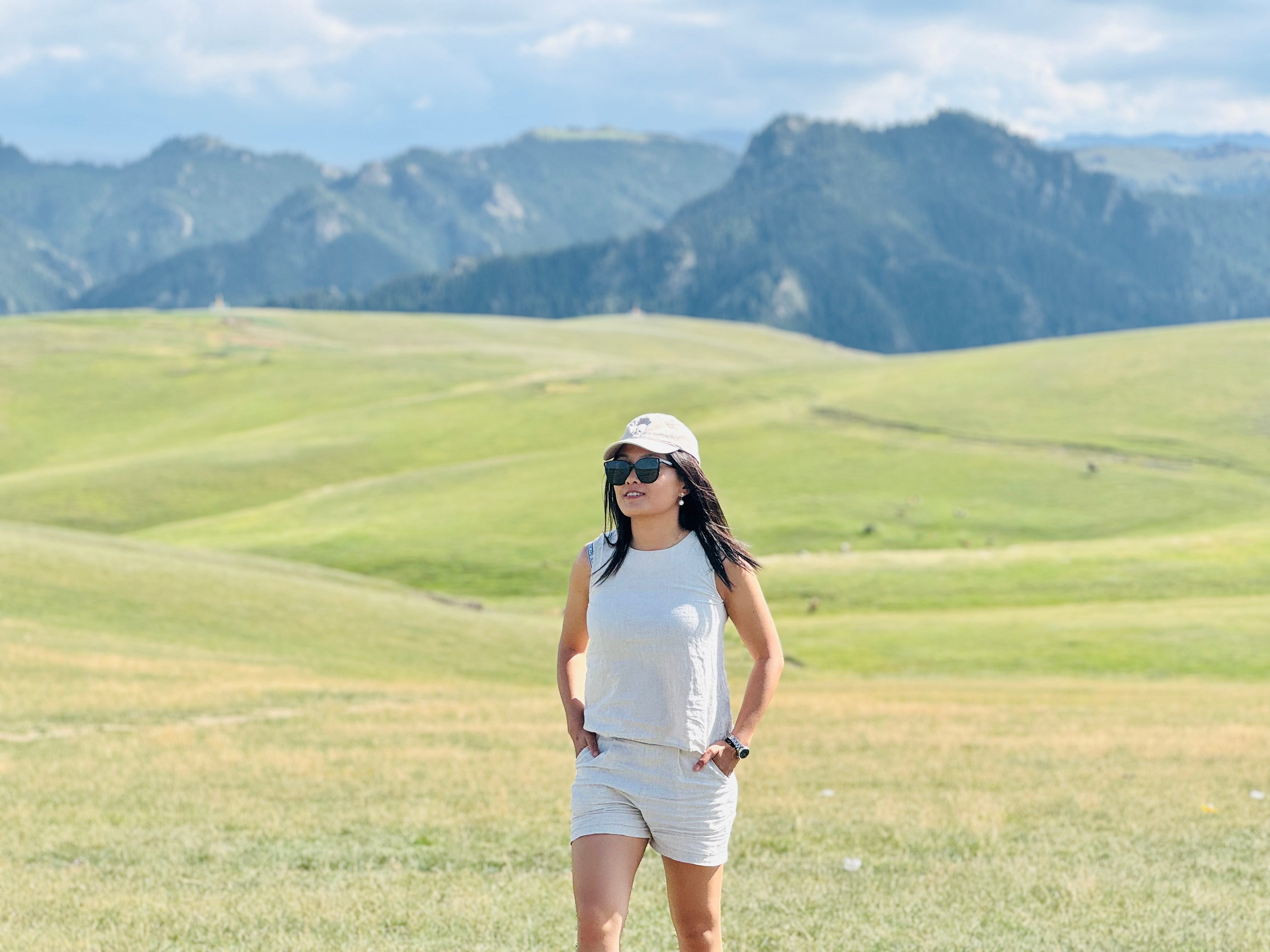 Yangyang Guo walking in Xinjiang's grasslands in China.