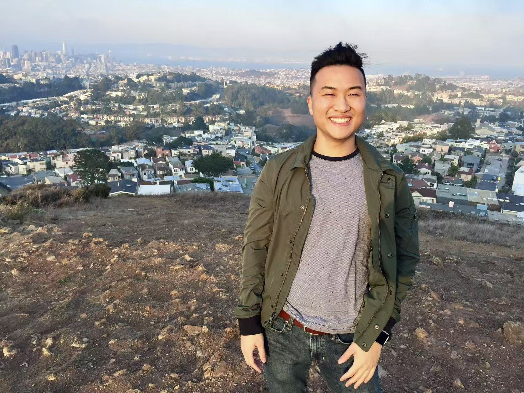 David Fun posing with San Francisco skyline in the background.
