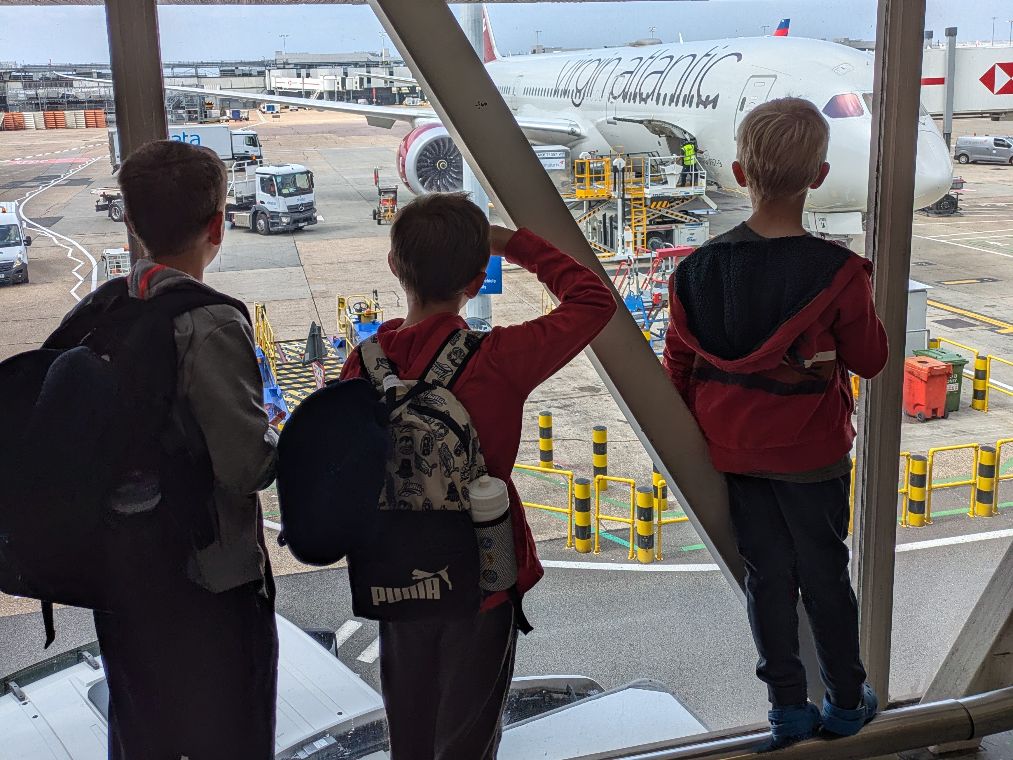 Kids looking at plane