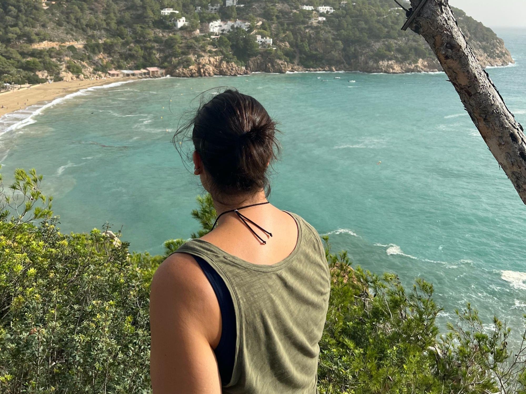 Anna Zucker traveling alone looking at a waterfront