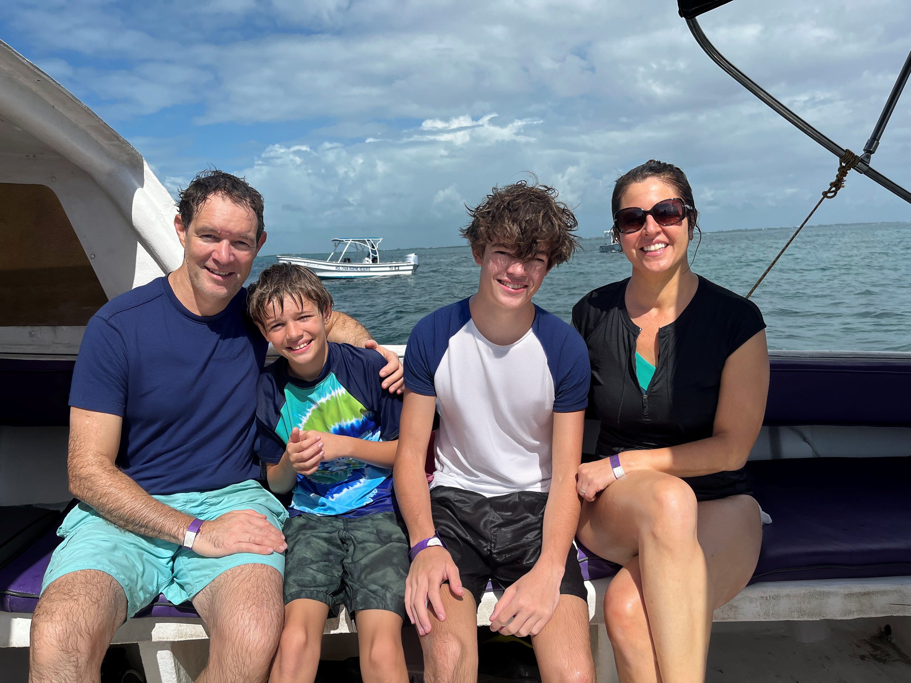 Author Christina Valhouli and her family smiling