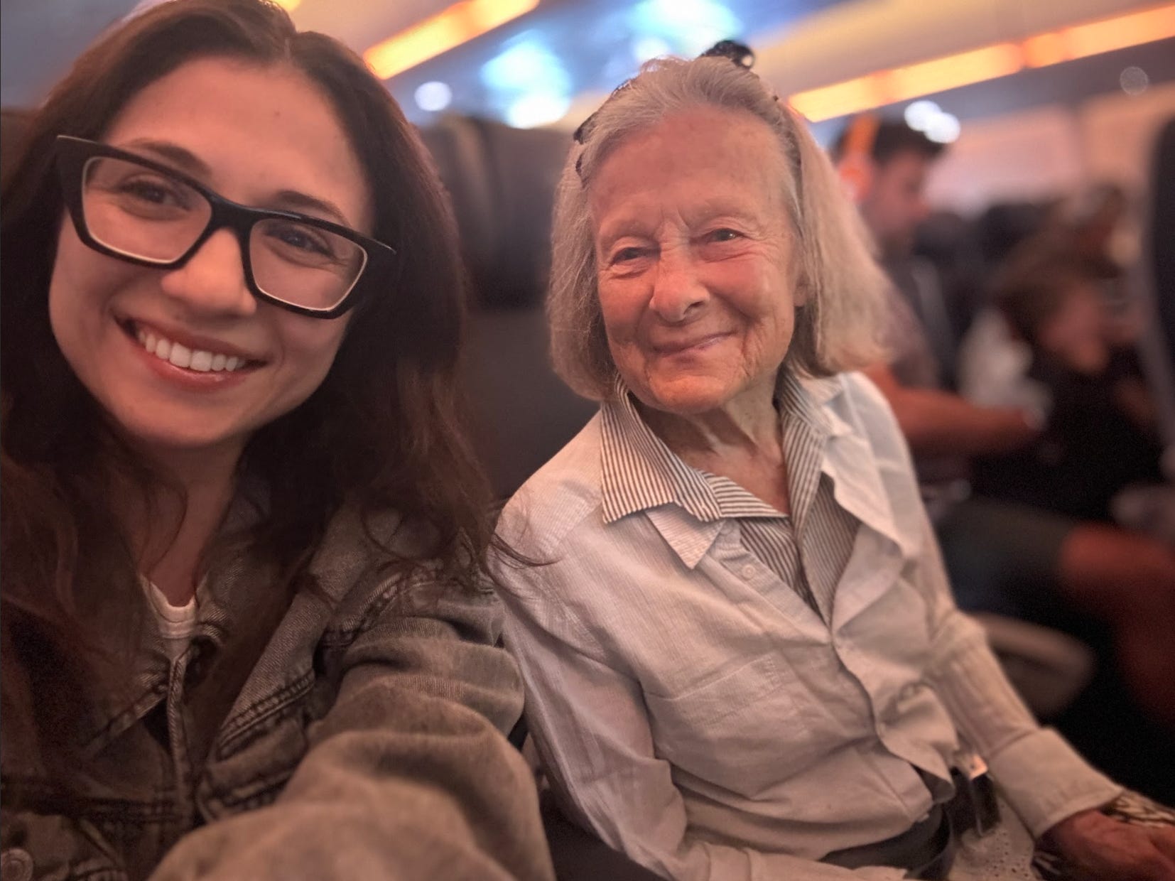 The writer and her pen pal, Anne, on a flight from Paris to the US.