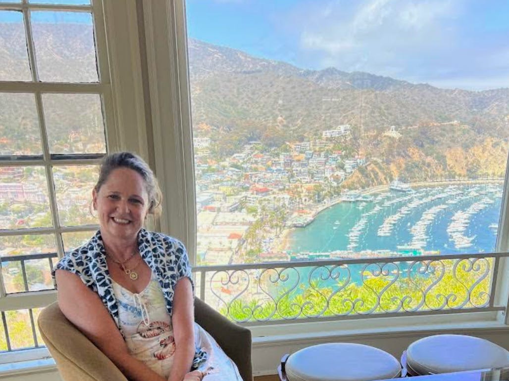 The writer posing in front of Catalina Island.