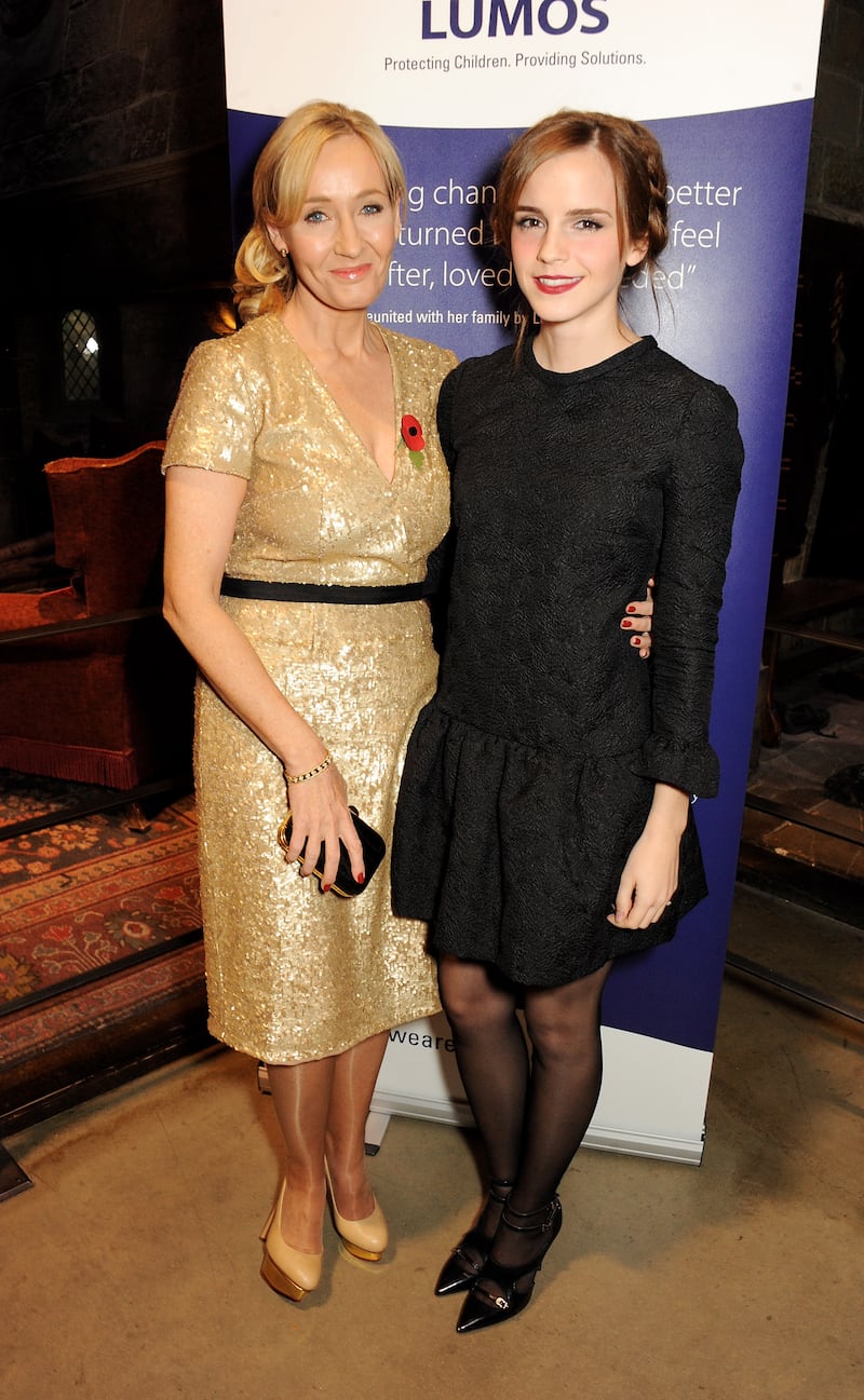 LONDON, ENGLAND - NOVEMBER 09:  J.K. Rowling (L) and Emma Watson attend the Lumos fundraising event hosted by J.K. Rowling at The Warner Bros. Harry Potter Tour on November 9, 2013 in London, England.