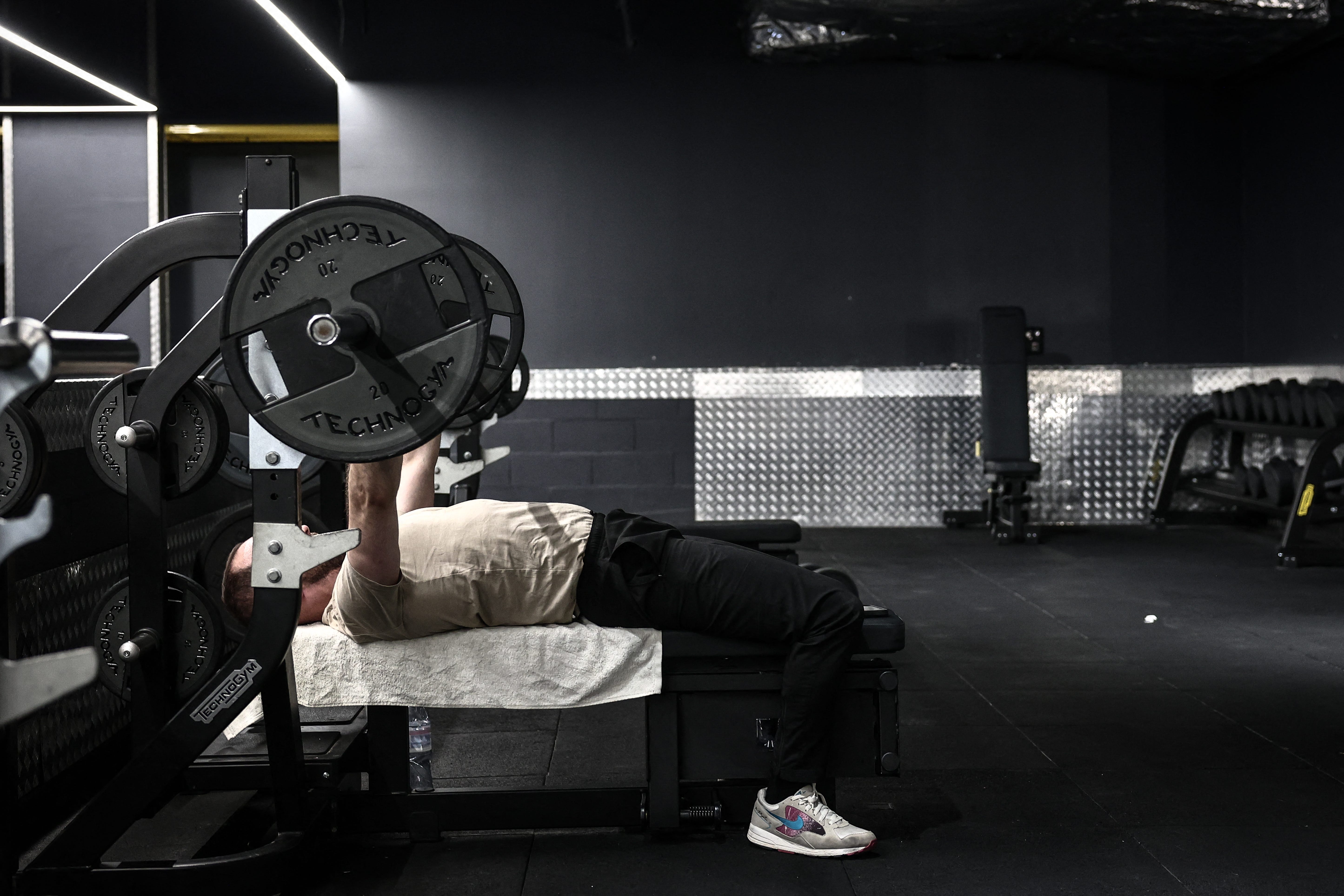 A man lifts weights