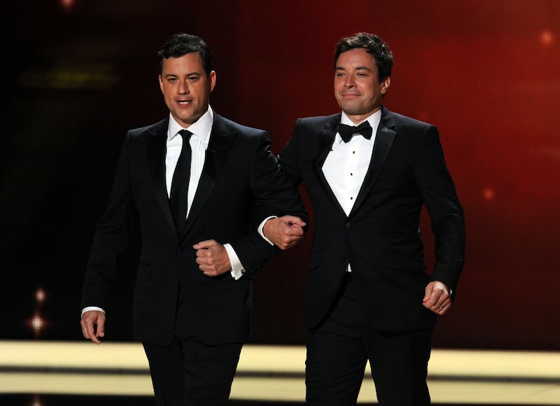 TV show host's Jimmy Kimmel (L) and Jimmy Fallon speak onstage during the 63rd Annual Primetime Emmy Awards held at Nokia Theatre L.A. LIVE on September 18, 2011 in Los Angeles, California.