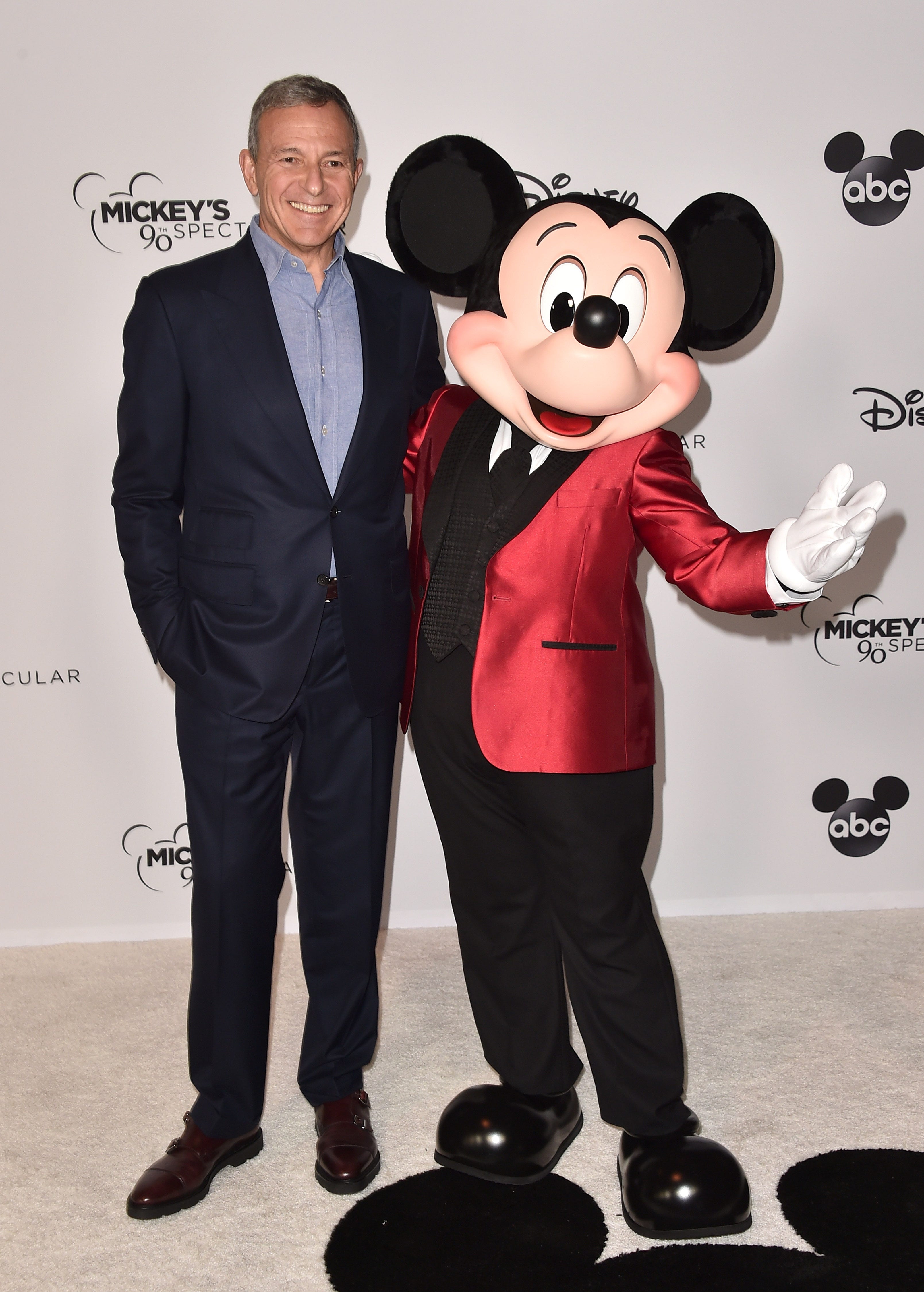 Disney CEO Bob Iger and Mickey Mouse