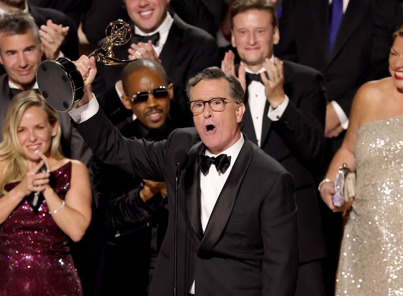 LOS ANGELES, CALIFORNIA - SEPTEMBER 14: Stephen Colbert accepts the Outstanding Talk Series Award for "The Late Show with Stephen Colbert" onstage during the 77th Primetime Emmy Awards at Peacock Theater on September 14, 2025 in Los Angeles, California.  (Photo by Kevin Winter/Getty Images)