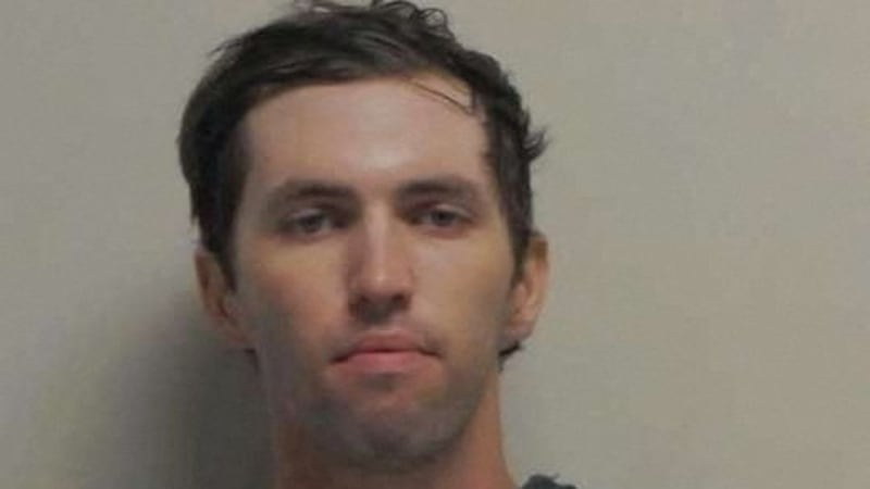 A police mugshot shows Tyler Robinson, the suspect in the fatal shooting of U.S. conservative commentator Charlie Kirk