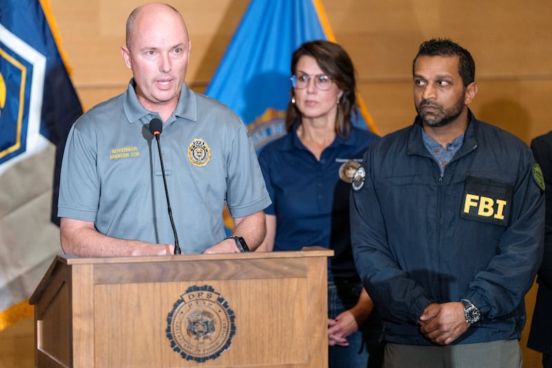 Utah Governor Spencer Cox speaks at a press conference, near FBI Director Kash Patel, at the Utah Valley University, after U.S. right-wing activist and commentator, Charlie Kirk, an ally of U.S. President Donald Trump, was fatally shot during an event at the university, in Orem, Utah, U.S. September 11, 2025. REUTERS/Cheney Orr