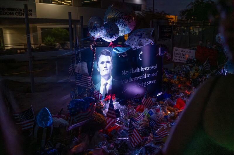 A poster of conservative activist Charlie Kirk is displayed at a memorial following the fatal shooting of Kirk, at the Turning Point USA headquarters in Phoenix, Arizona, U.S., September 12, 2025. REUTERS/Thomas Machowicz