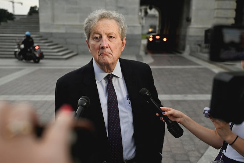 U.S. Senator John Neely Kennedy talks to press