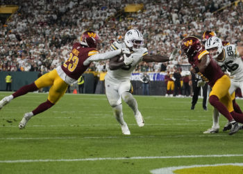 Many sports fans are unhappy with how much it costs to watch their games, AP-NORC poll finds