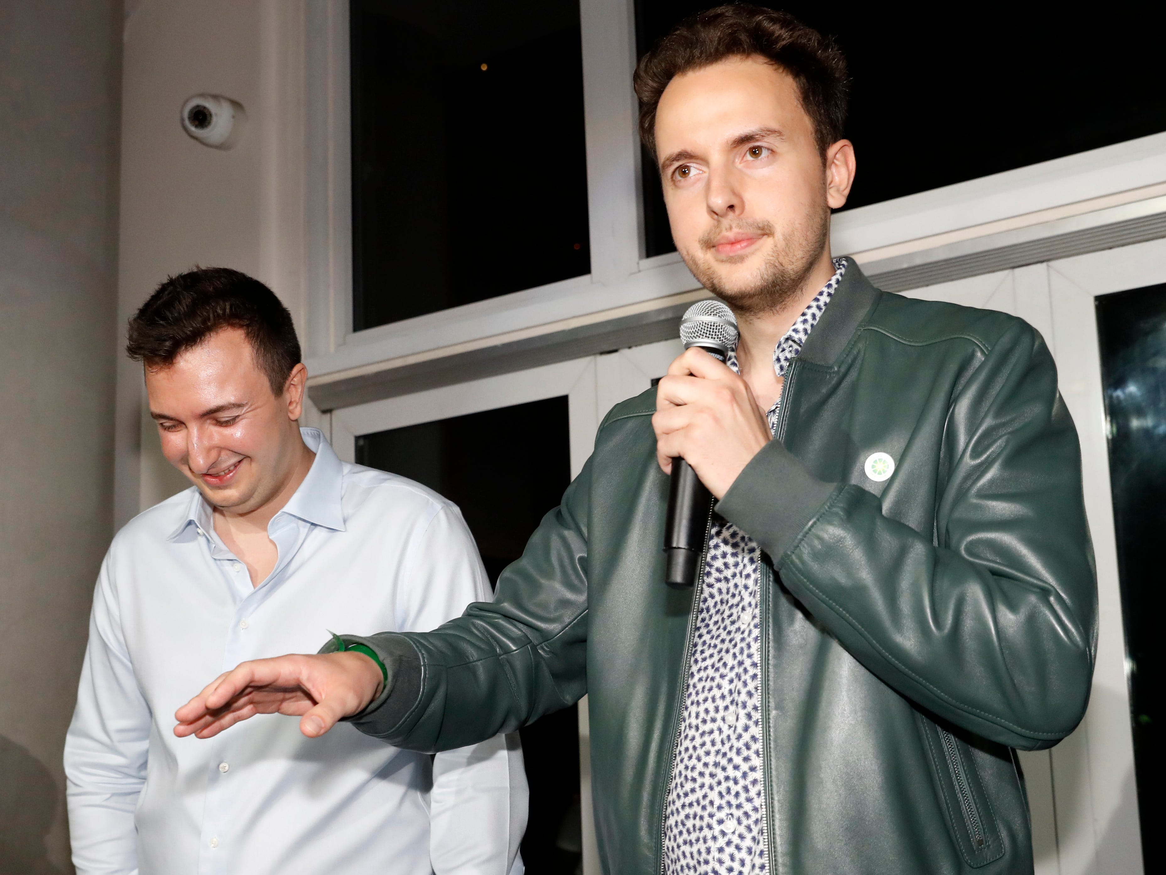 Julian Zehetmayr (left) and Paul Zehetmayr (right) are attending a party in New York City.