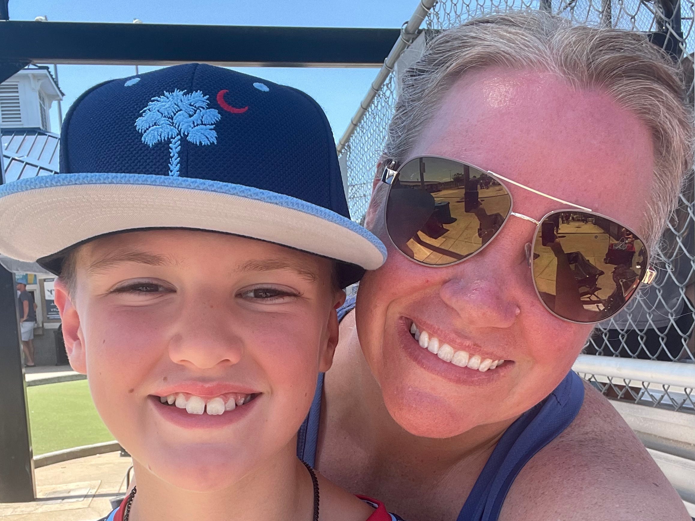 The author poses with her son.