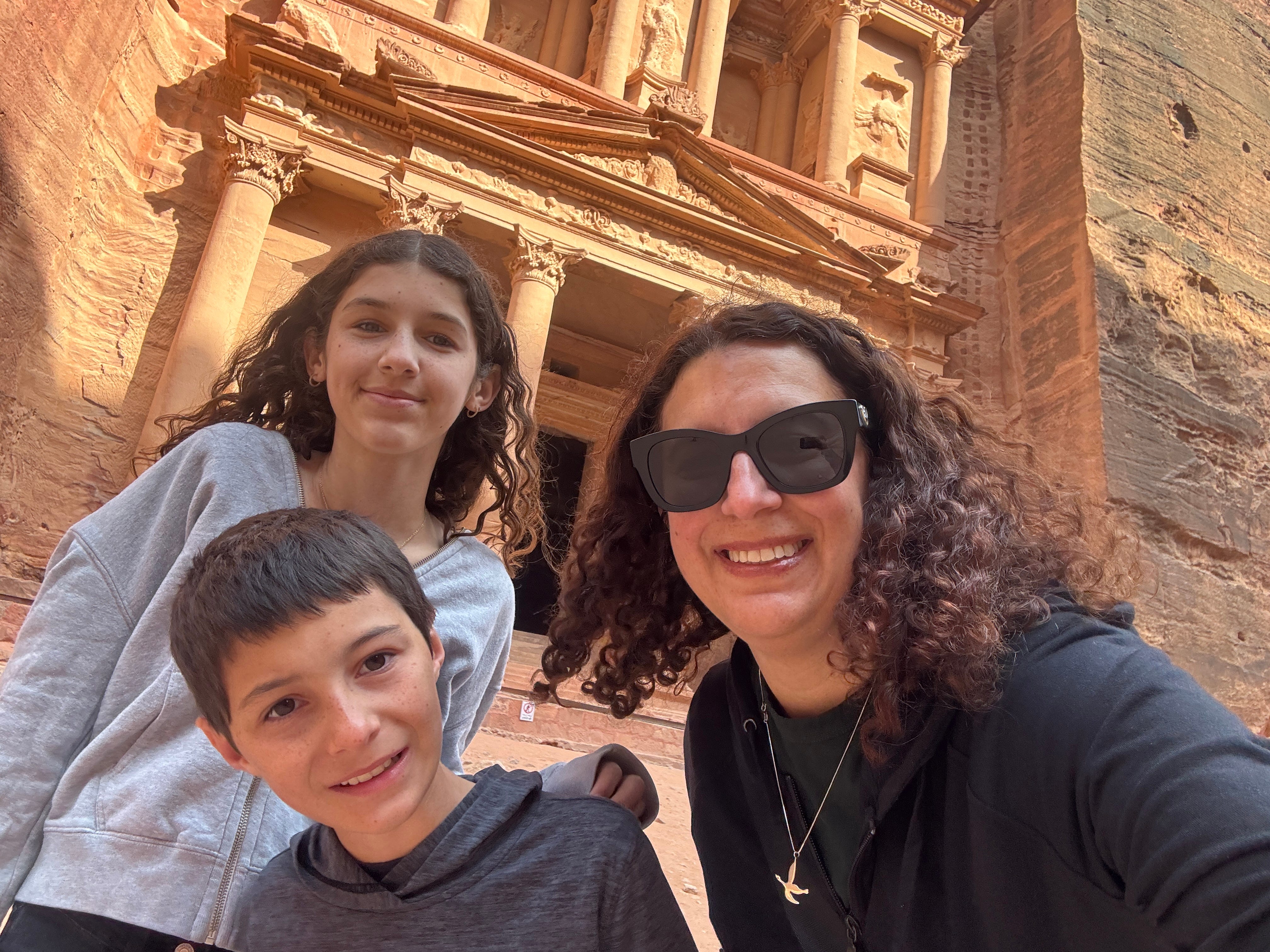The author with two of her children on a trip to Jordan.