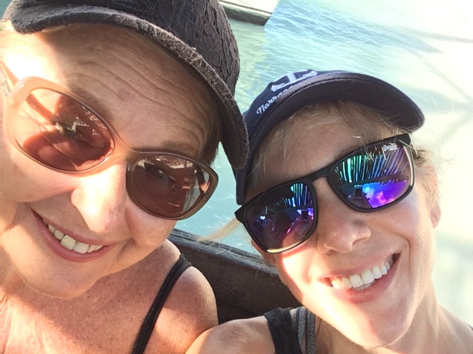 Author Sarah DiMuro smiling with mother-in-law with sunglasses on