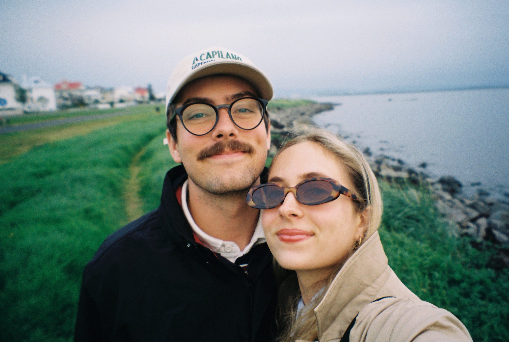 Author Tiana Molony and man with glasses smiling in selfie