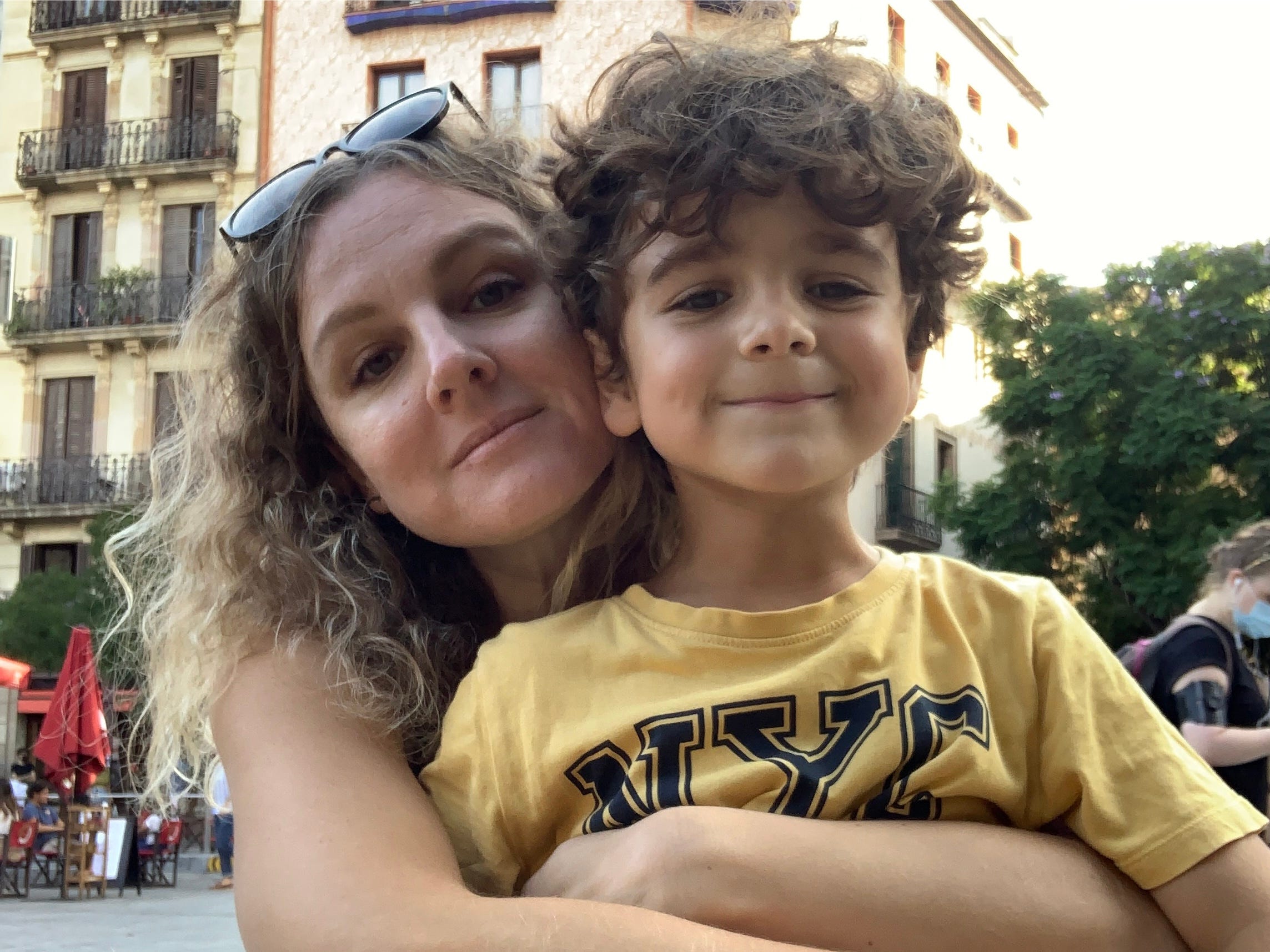 The author and her so at a cafe in Barcelona.