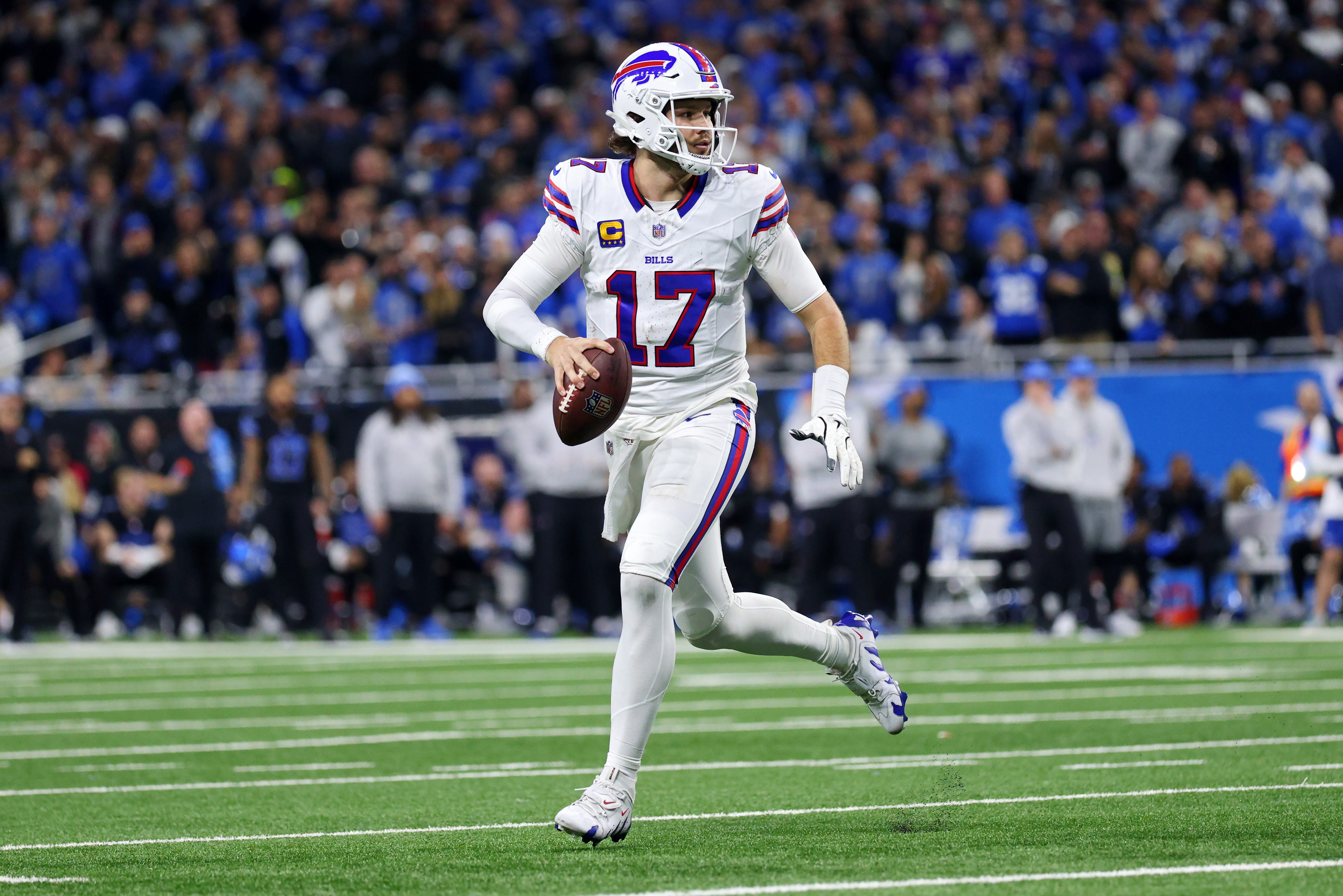 Josh Allen of the Buffalo Bills drops back to pass during a 2024 NFL game.