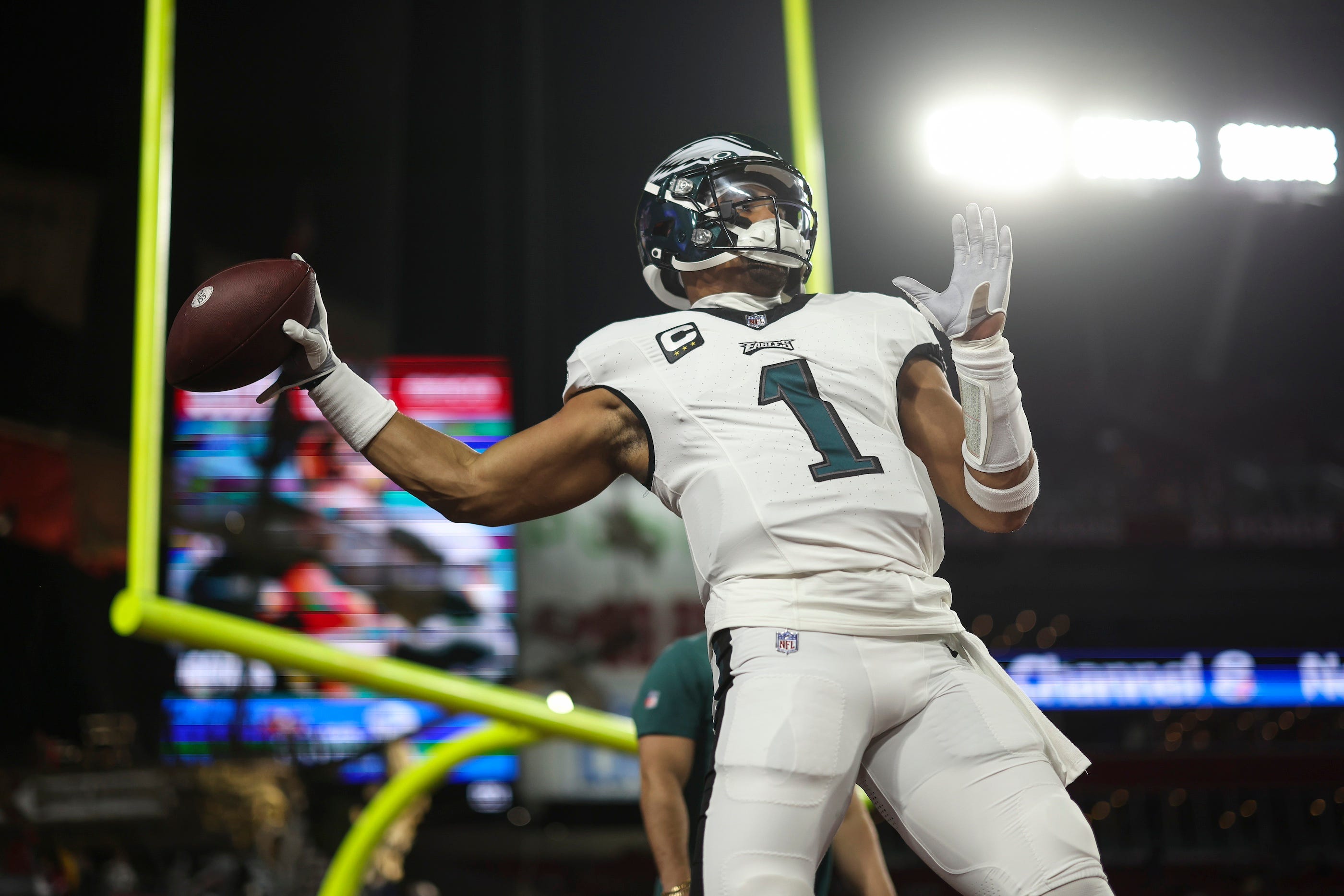 Philadelphia Eagles quarterback Jalen Hurts gets ready to throw the football during the 2024 NFL Wild Card game.