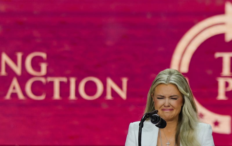 Erika Kirk reacts as she speaks onstage during a memorial service for her husband, conservative commentator Charlie Kirk, at State Farm Stadium in Glendale, Arizona on September 21, 2025.