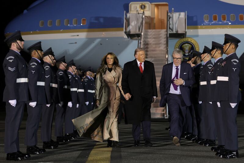 STANSTED, ESSEX - SEPTEMBER 16: U.S. President Donald Trump and First Lady Melania Trump exit Air Force One after arriving at London Stansted Airport for a state visit on September 16, 2025 in Stansted, Essex. President Trump is in England from Sept. 16-18 on his second UK state visit, with the previous one taking place in 2019 during his first presidential term. (Photo by Anna Moneymaker/Getty Images)