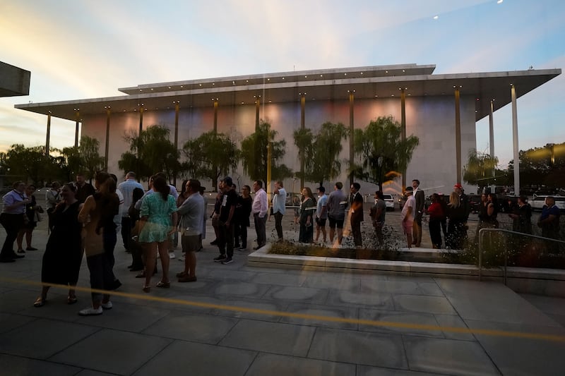 A crowd is seen outside the Kennedy Center after a vigil for conservative activist Charlie Kirk, who was was fatally shot during an event at Utah Valley University, reached seating capacity, in Washington, D.C., U.S., September 14, 2025. REUTERS/Elizabeth Frantz