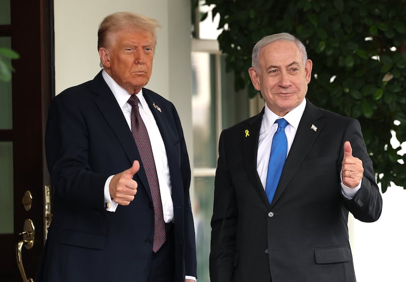 President Donald Trump and Israeli Prime Minister Benjamin Netanyahu give a thumbs up while standing outside the White House as Netanyahu arrived for meetings on on September 29, 2025.