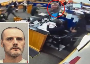Shackled-inmate lumbers into podium in Florida court during goofy tantrum as he spits at judge, storms bench: video