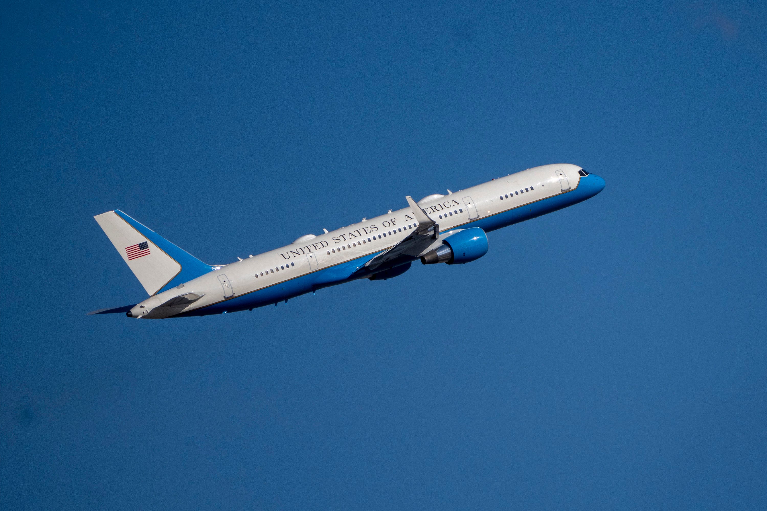 Air Force Two flies through the sky.
