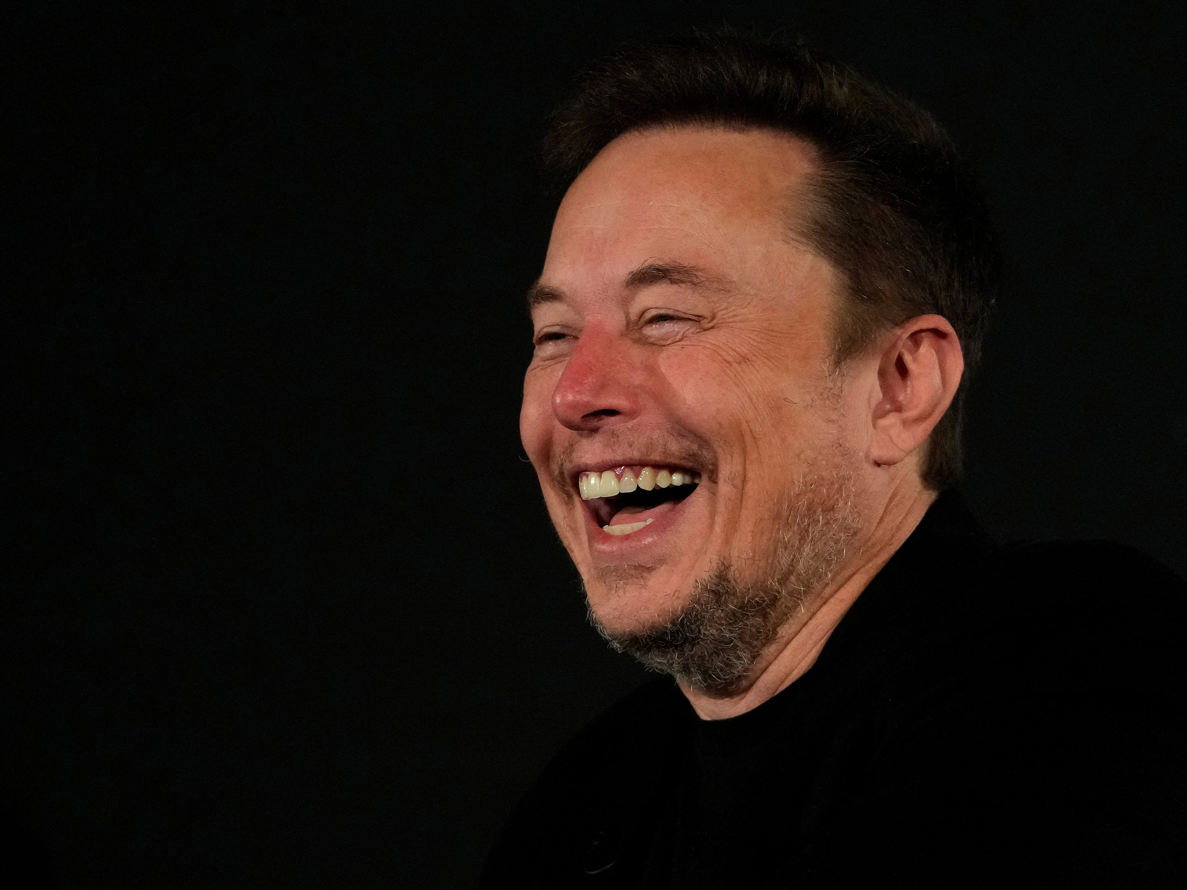 Tesla and SpaceX's CEO Elon Musk laughs during an in-conversation event with British Prime Minister Rishi Sunak in London, Britain, Thursday, Nov. 2, 2023.