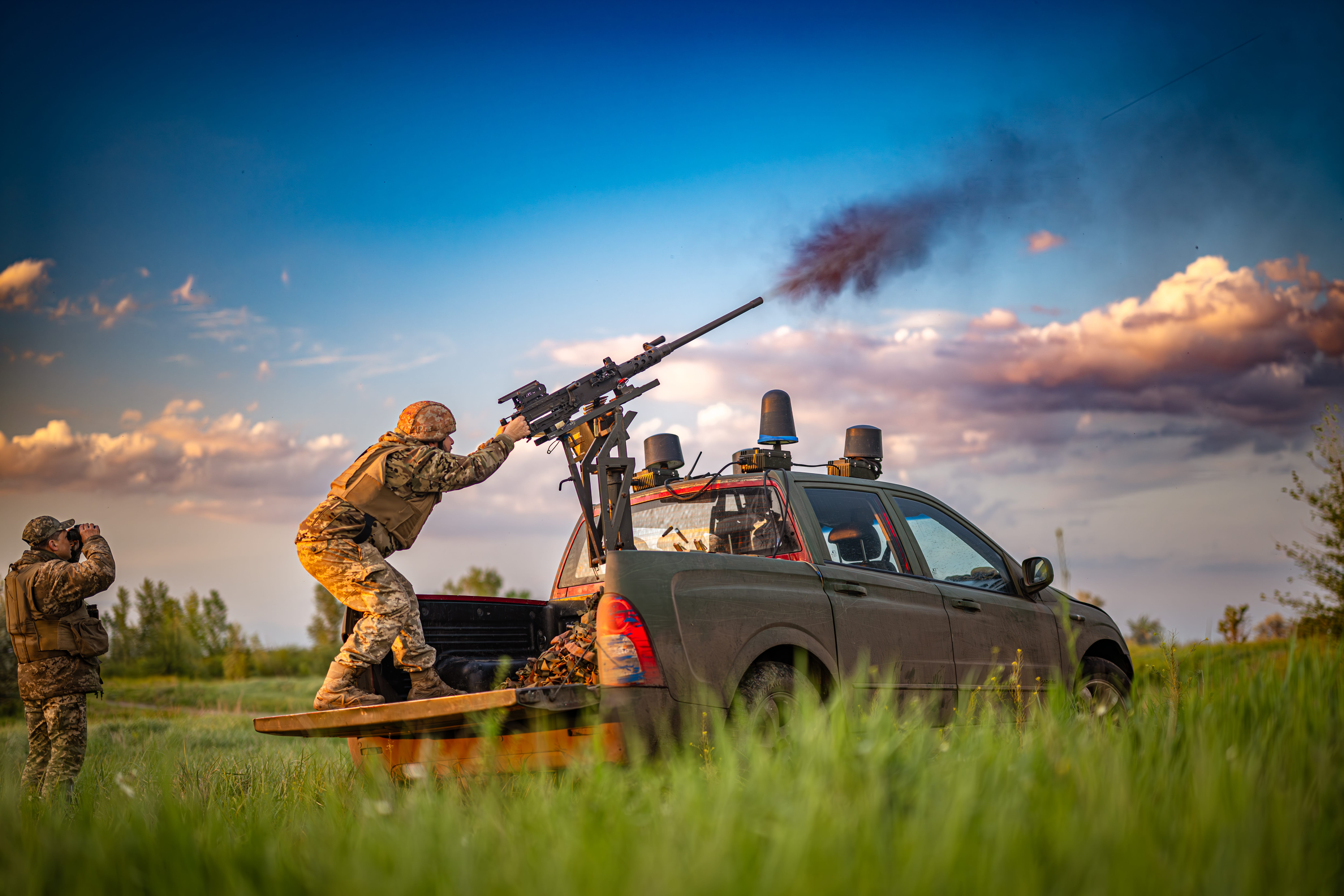 A Ukrainian mobile fire group opens fire into the sky.