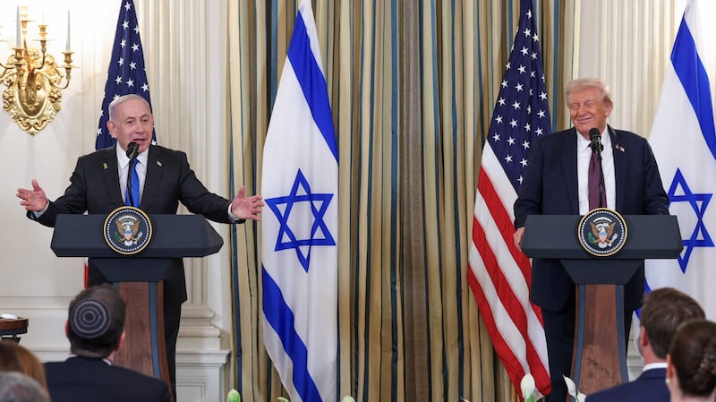 U.S. President Donald Trump and Israeli Prime Minister Benjamin Netanyahu react during a joint press conference in the State Dining Room at the White House in Washington, D.C., U.S., September 29, 2025.  TPX IMAGES OF THE DAY
