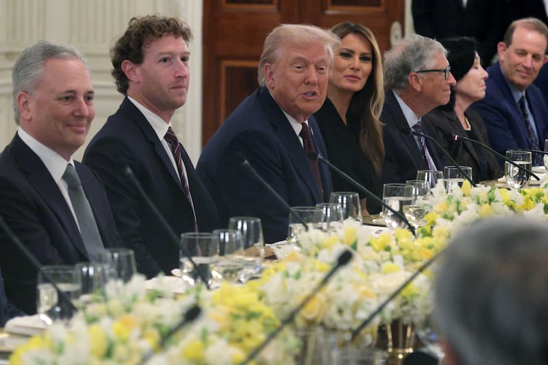 WASHINGTON, DC - SEPTEMBER 04: U.S. President Donald Trump speaks as (L-4th L) White House “AI and Crypto Czar” David Scahs, Meta CEO Mark Zuckerberg, and first lady Melania Trump listen during a dinner at the State Dining Room of the White House on September 4, 2025 in Washington, DC. President Trump hosted tech and business leaders for dinner after they joined the first lady’s meeting of the Artificial Intelligence (AI) Education Task Force at the White House this afternoon. (Photo by Alex Wong/Getty Images)