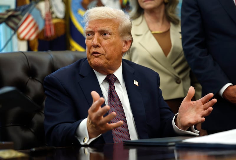 WASHINGTON, DC - SEPTEMBER 15: U.S. President Donald Trump answers questions from reporters after signing a Presidential Memorandum in the Oval Office on September 15, 2025 in Washington, DC. Trump signed a memorandum that will send members of the National Guard and federal law enforcement agencies to Memphis, Tennessee in an effort to decrease crime in the city. (Photo by Kevin Dietsch/Getty Images)