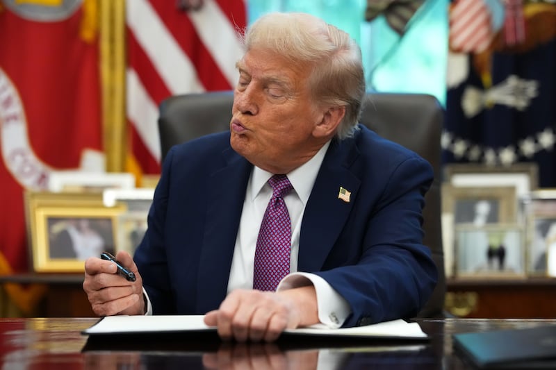 President Donald Trump signed executive orders in the Oval Office on September 05, 2025 included one to rename the Department of Defense the Department of War.