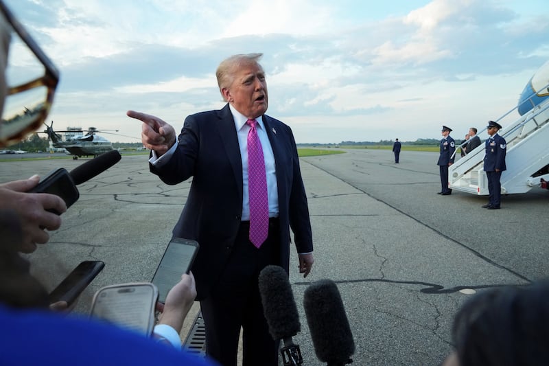 U.S. President Donald Trump speaks to the media before boarding Air Force One to depart for Washington, at Morristown Municipal Airport in Morristown, New Jersey, U.S., September 14, 2025. REUTERS/Ken Cedeno