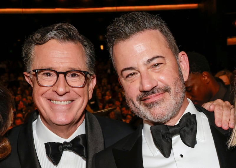 LOS ANGELES, CALIFORNIA - SEPTEMBER 14: (L-R) Evelyn McGee-Colbert, Stephen Colbert, Jimmy Kimmel, and Molly McNearney attend The 77th Primetime Emmy Awards at Peacock Theater on September 14, 2025 in Los Angeles, California. (Photo by Francis Specker/CBS via Getty Images)