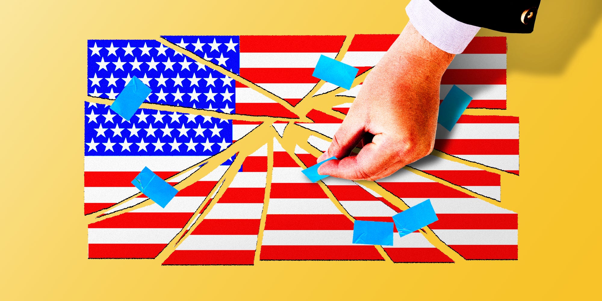 A business man's hand taping up the American flag