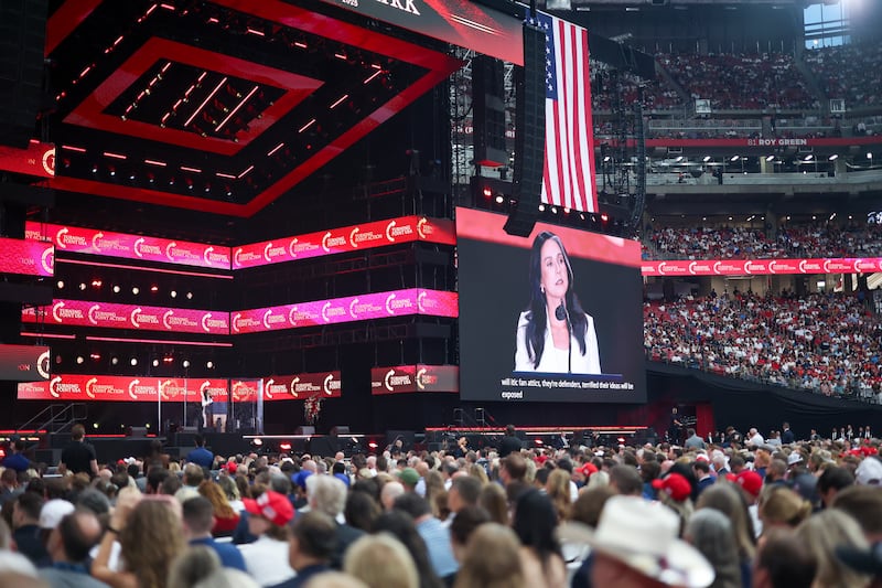 GLENDALE, ARIZONA - SEPTEMBER 21: Director of National Intelligence Tulsi Gabbard speaks during the memorial service for political activist Charlie Kirk at State Farm Stadium on September 21, 2025 in Glendale, Arizona. Kirk, the CEO and co-founder of Turning Point USA, was shot and killed on September 10th while speaking at an event during his "American Comeback Tour" at Utah Valley University. (Photo by Eric Thayer/Getty Images