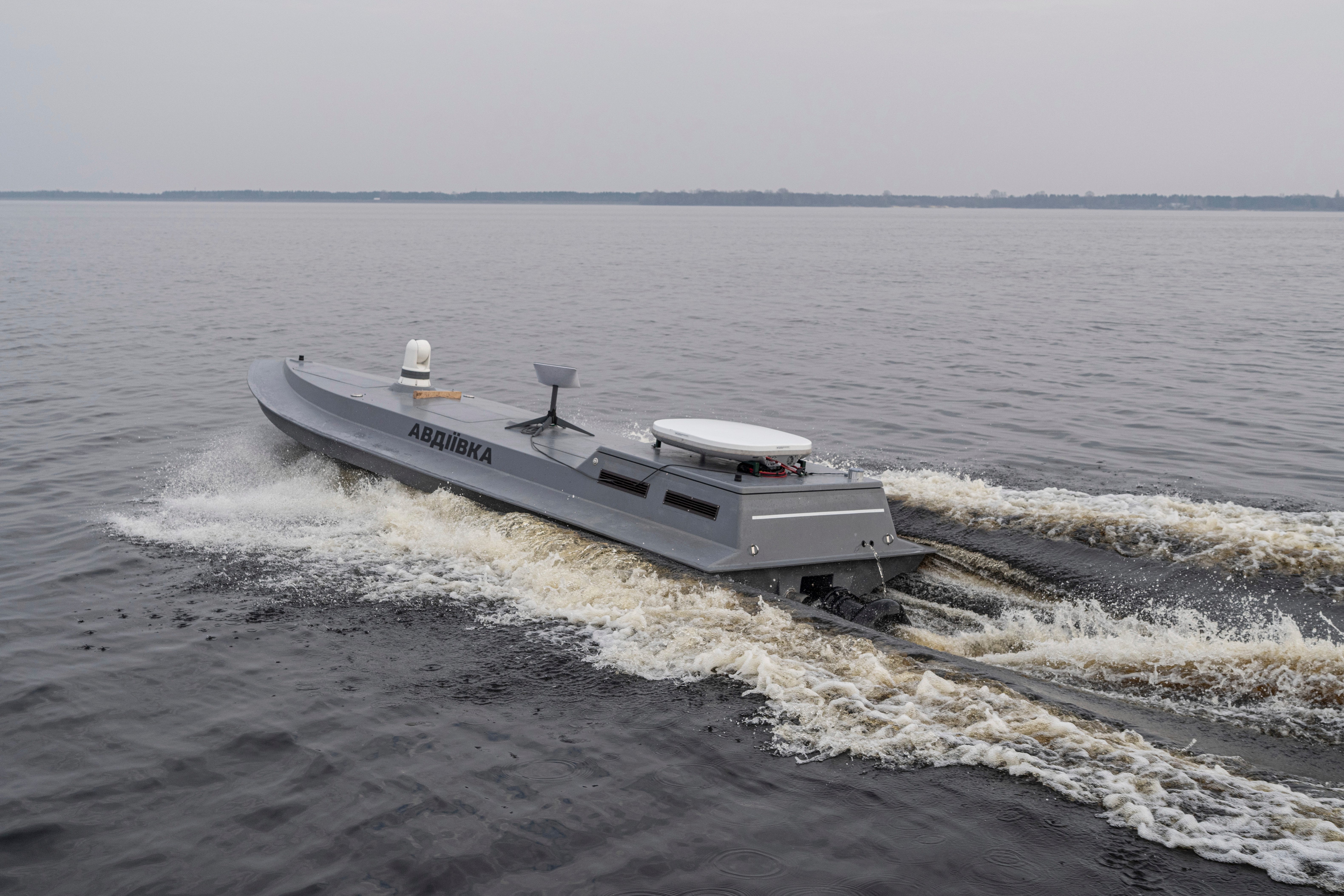 A naval drone moves through the water during the presentation by Ukraine's Security Service in the Kyiv region on March 5, 2024.