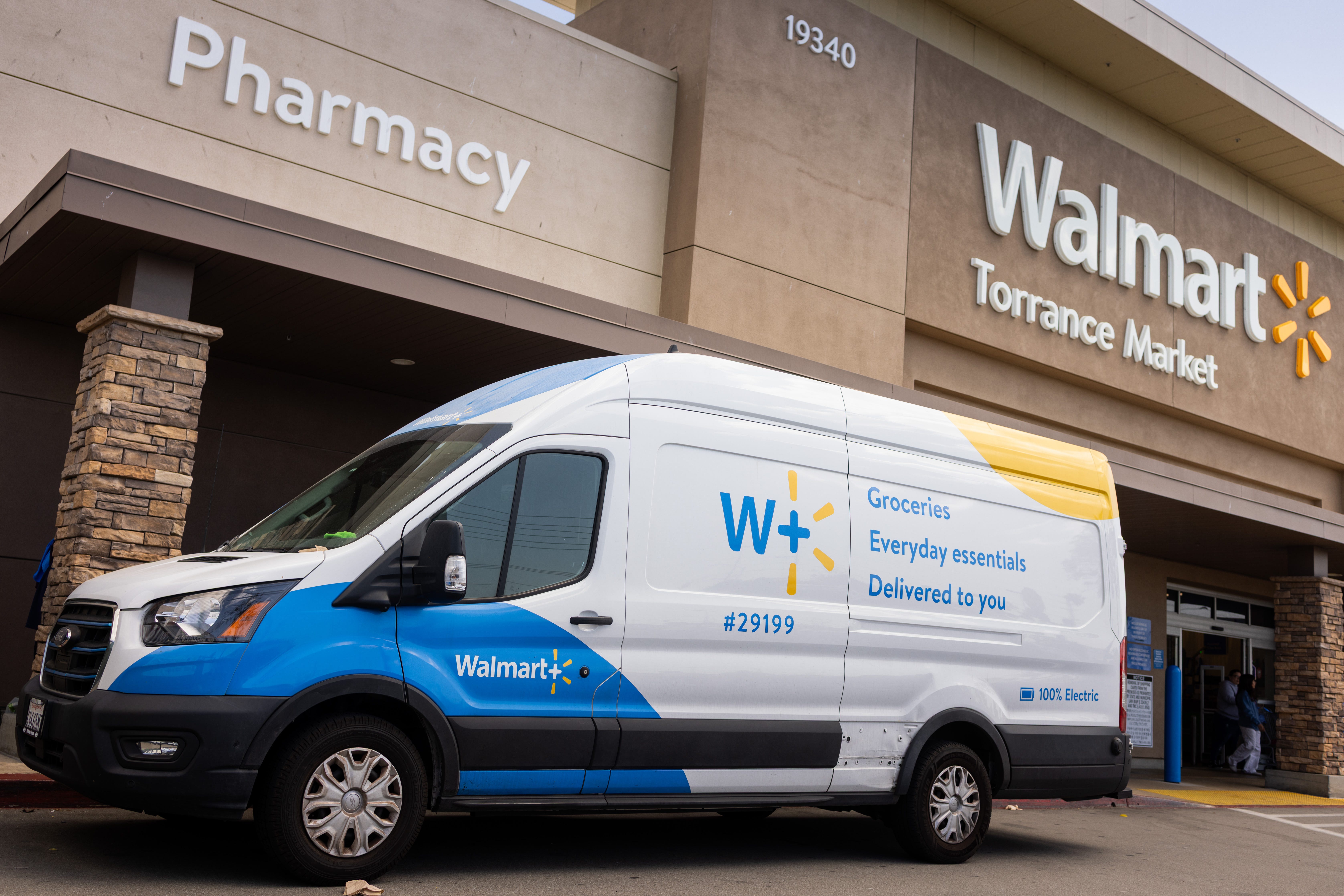 A Walmart delivery van parked in front of the Walmart Torrance Market, on April 3, 2025 in Torrance, California.
