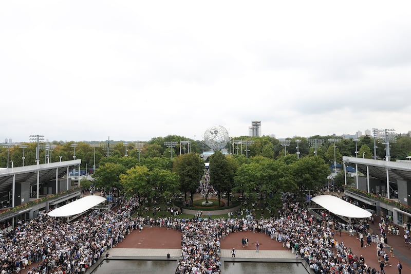 Sep 7, 2025; Flushing, NY, USA;  Fans enter Arthur Ashe stadium prior to the final of men singles between Jannik Sinner (ITA) (not pictured) and Carlos Alcaraz (ESP) (not pictured) at Billie Jean King National Tennis Center.  Mandatory Credit: Mike Frey-Imagn Images