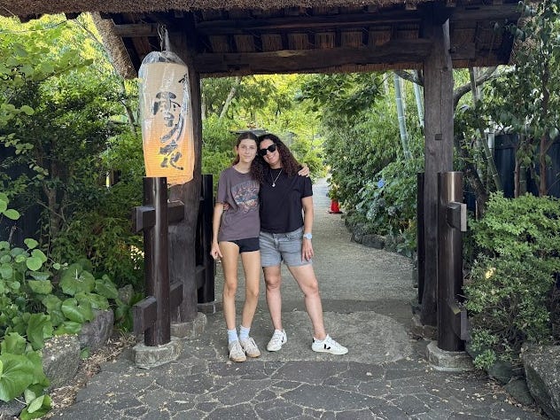 The author poses with her teenage daughter.