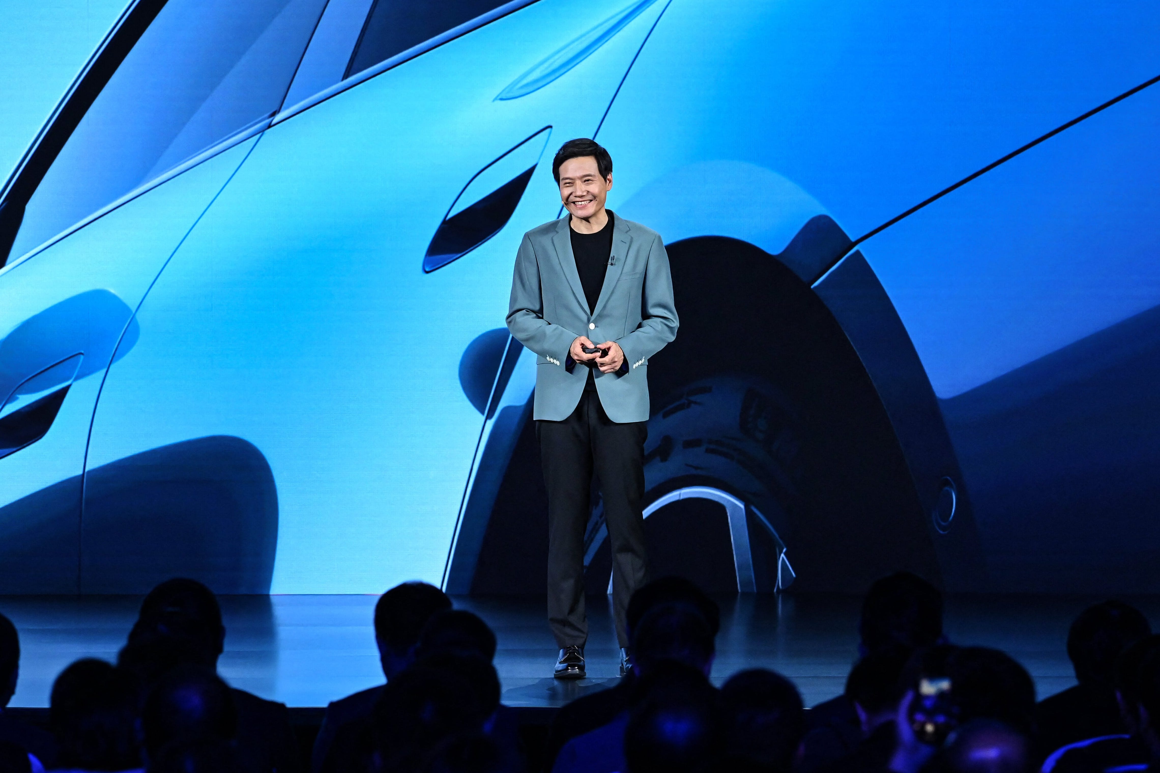 Xiaomi CEO Lei Jun launches the SU7 EV in Beijing on March 28
